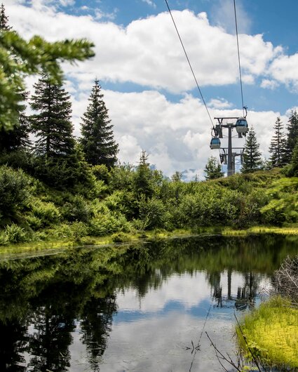 Die Grasjoch Bahn im Sommer berhalb eines kleinen Bergsees in der Silvretta Montafon. | © Silvretta Montafon - Marc Obrist