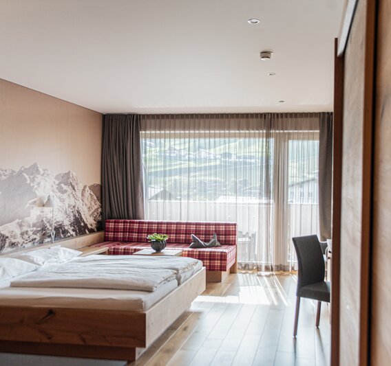 sporthotel_silvretta_montafon_junior_suite_lichtdurchflutetes_helles_hotelzimmer | © Silvretta Montafon - Mara Baues